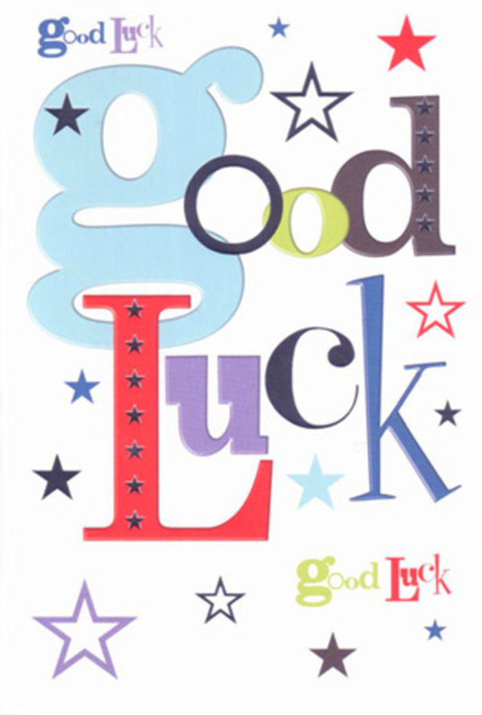 This photograph features a luck-themed greeting card that feels like a miniature celebration laid out on a tabletop, much like the display stands in a cosy Hoddesdon flower shop. Centred in the frame is the phrase 'Good Luck', sprawled in large, playful letters that vary in colour, weight, and style. A broad, pastel blue 'g' starts the phrase with a friendly curve, followed by characters in deep reds, earthy moss greens, rich purples, and classic blacks, some with chunky, solid forms, others more slender and upright, echoing the easy mix of old and new shopfronts along the streets near Hoddesdon Clock Tower. The letters sit on a pure white background that feels fresh, uncluttered, and modern, like a blank page at the beginning of a new chapter. Around the words, a lively constellation of stars is scattered: some tiny and charcoal-dark, others mid-sized in navy and indigo, and a few larger shapes washed in sky-blue, lavender, and zesty lime. They appear to float outward from the message, as if the card is gently sending its wishes across town-from someone's kitchen table all the way to a new workplace or college campus. The card-stock looks substantial and smooth, neither glossy nor textured, with edges that appear crisply cut and satisfying to hold. Light falls evenly across the surface, enhancing the saturation of the blues and reds while keeping the white background cool and clean. The overall impression is of a cheerful talisman: simple yet expressive, perfect to tuck next to a bright bouquet delivered to a home near Barclay Park or handed directly to a friend standing outside the station. The design conveys more than just polite good wishes; it radiates encouragement, solidarity, and the quiet bravery required to step into something new.