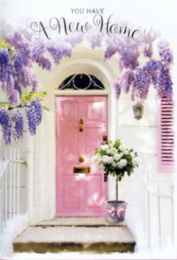 In this evocative house-front scene, a Hoddesdon doorway is wrapped in the soft embrace of pastel colour and fragrant blooms, perfectly capturing the feeling of crossing the threshold into a new chapter. The door itself is painted a tender shade of pink, neither too bold nor too pale, just enough to radiate warmth against the clean whitewashed walls. A matching shutter, slightly ajar, hints at light and life within, while the surrounding wisteria tumbles down from above in generous cascades of lavender blossoms. Each wisteria vine is heavy with clustered flowers, suggesting early summer fragrance and a sense of timeless romance, like something one might stumble upon while wandering the older streets around Lord Street. At the foot of the steps, placed with intentional care, stands a grey tin bucket overflowing with roses in shades of white and cream. The roses are fully open yet still fresh, their layered petals catching glints of soft light, and arranged to create a round, abundant silhouette. Sprigs of cool green foliage poke out between the blooms, introducing contrast and a hint of wildness that keeps the design from feeling too formal. A satin ribbon in blush pink is tied around the bucket in a smooth, elegant bow, mirroring the door color and making the arrangement feel thoughtfully finished. The whole composition suggests a housewarming gift or a congratulatory bouquet, perhaps just delivered to a new home in Hoddesdon by a caring friend or family member. There is a gentle hum of happiness within the image: an unspoken message that says, 'this place is yours now; may it be filled with joy, laughter, and the soft beauty of flowers.'
