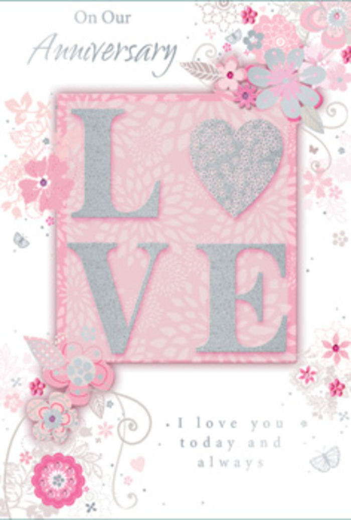 The anniversary card shown here feels like a paper echo of a romantic bouquet crafted by a careful florist in Hoddesdon. Its design centres on the word LOVE, set proudly in the middle in raised, tactile lettering, the surfaces adorned with a sprinkling of fine glitter that looks almost like scattered starlight. The glitter is concentrated along the edges of the letters, creating a soft halo effect that shimmers as the card tilts, while the core of each letter remains a smooth, pale tone. Behind and around this word stretches a gentle field of blush pink, tinged with hints of pearly whites and silvery greys, giving the background a velvety, luminous quality. Flowing across this backdrop are stylised flowers and foliage, drawn in elegantly sweeping lines that recall the first pen strokes of a florist mapping out an anniversary arrangement. The blossoms themselves are petite and refined, in shades of blush, ivory, and muted grey, with selective silver detailing that emphasizes their contours without competing with the central text. The floral elements are gathered more densely near the corners and edges, then trail inward in graceful arcs, framing the word LOVE like a garland wrapped around a treasured picture frame. The sense of movement is gentle and rhythmic, as if a breeze were stirring the petals. Inside, an understated script carries sincere words of love and appreciation, aligning perfectly with the visual softness of the card. The entire composition feels quietly celebratory, like a candlelit meal at home in Hoddesdon with fresh flowers on the table: intimate, thoughtful, and full of unspoken gratitude for the years already shared and those still to come.